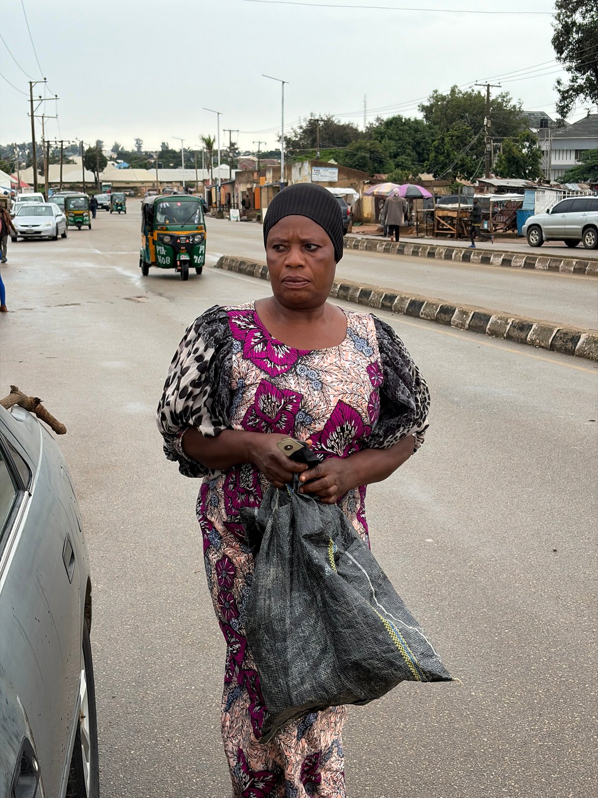 Wet morning street life across Jos, Nigeria
