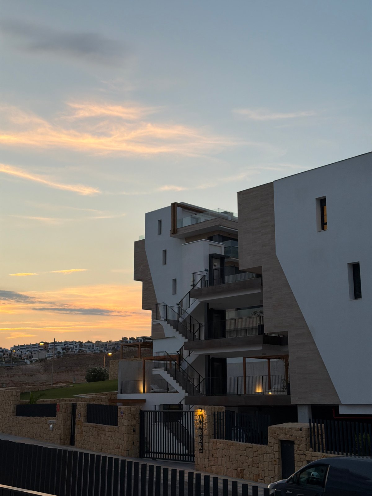 Afternoon at a Finestrat resort: pools, padel, and hilltop views