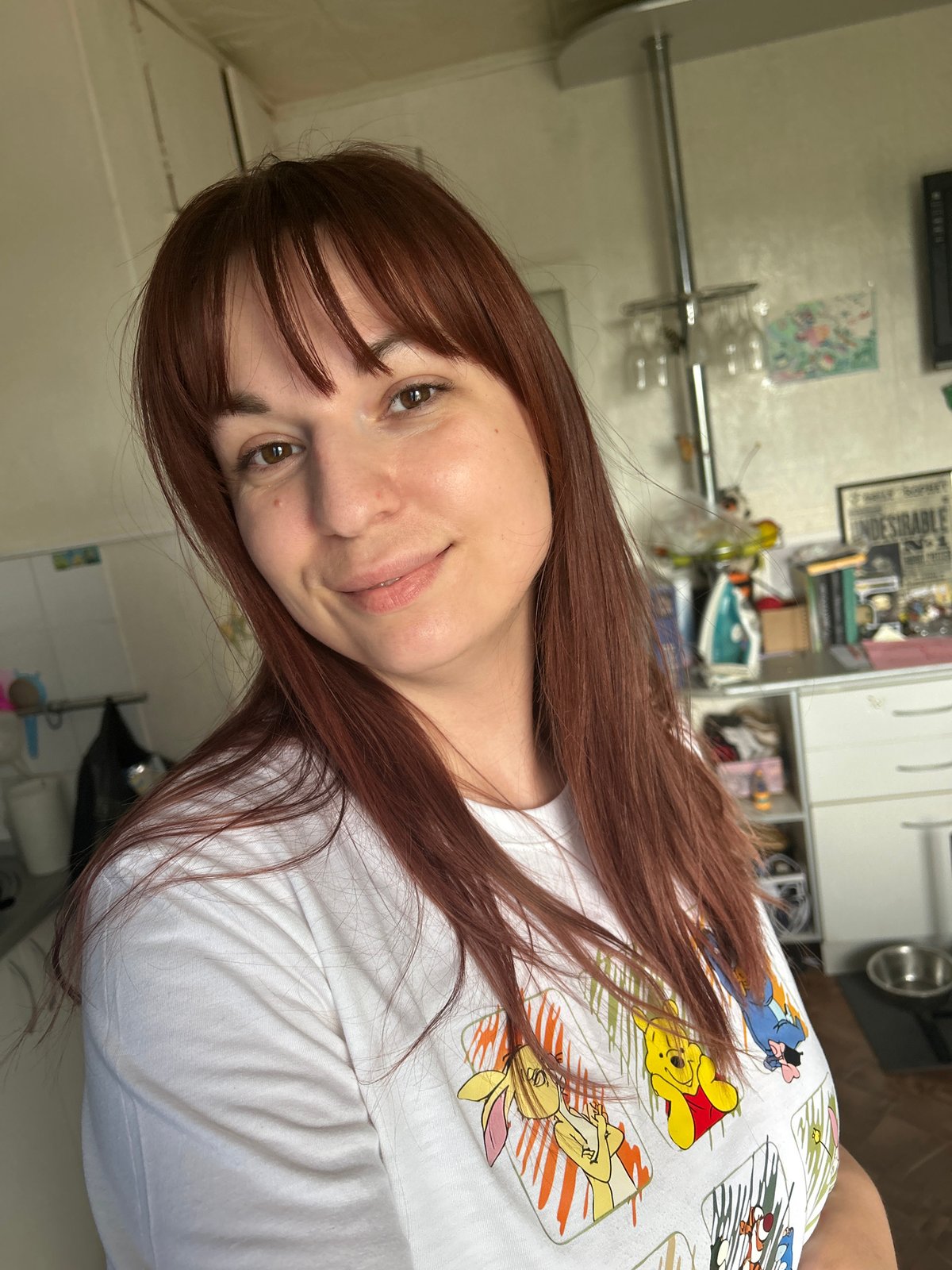 Woman in Winnie Pooh shirt documented across locations in Russia