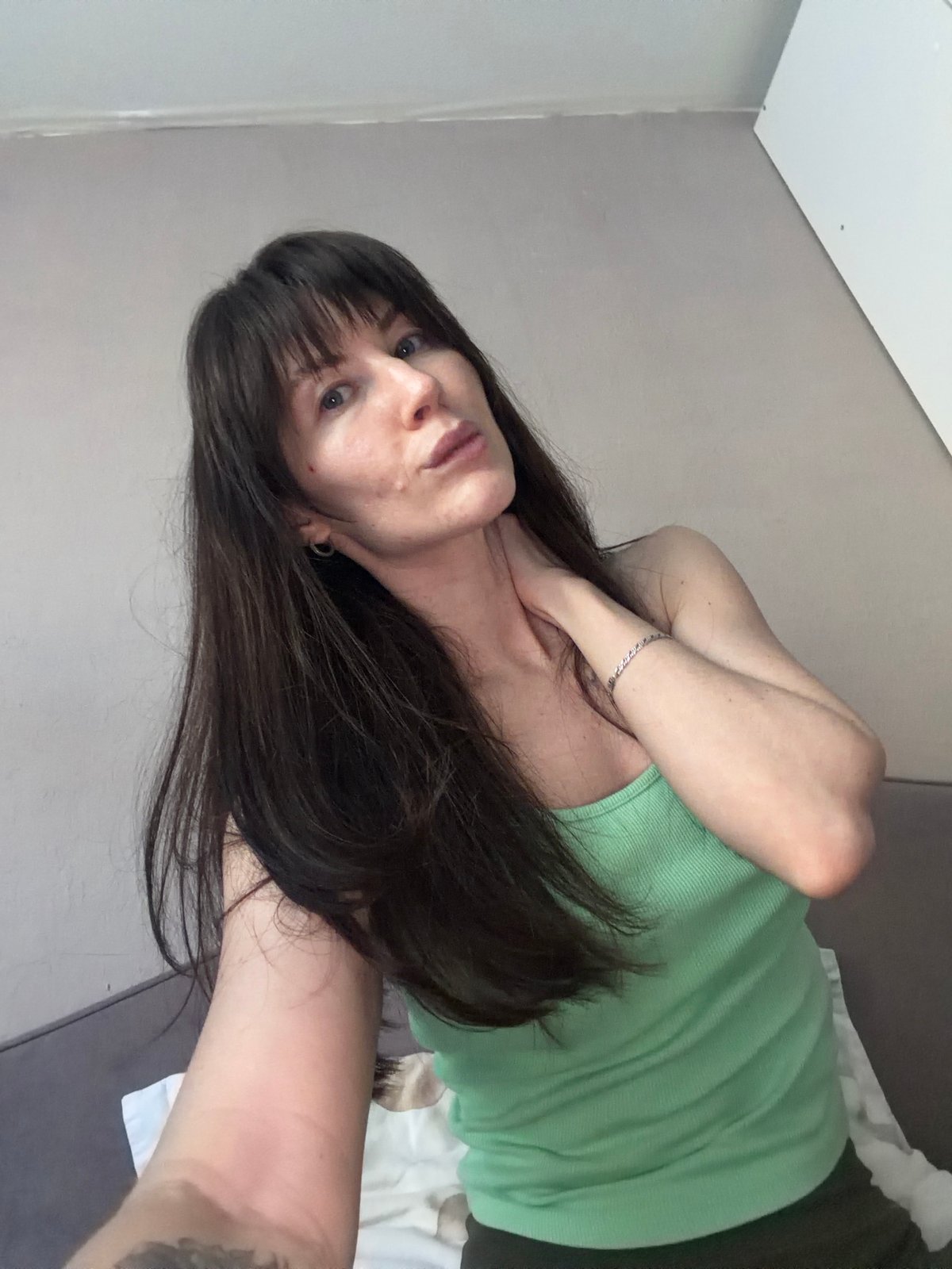 Woman documents morning skincare routine with selfies in Perm