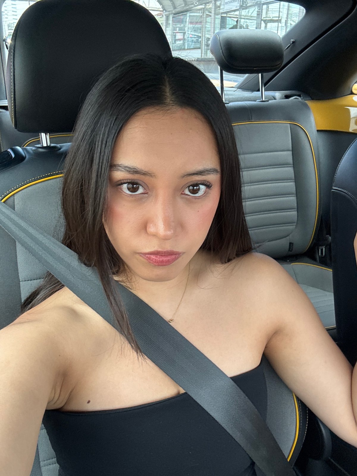 Woman photographed in driver's seat in Puebla, Mexico