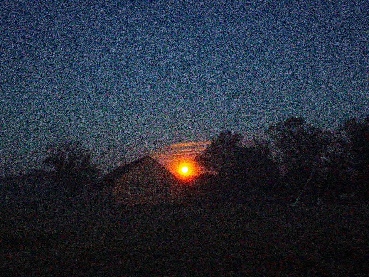 Evening documentation captures rural Ukraine village transition from twilight