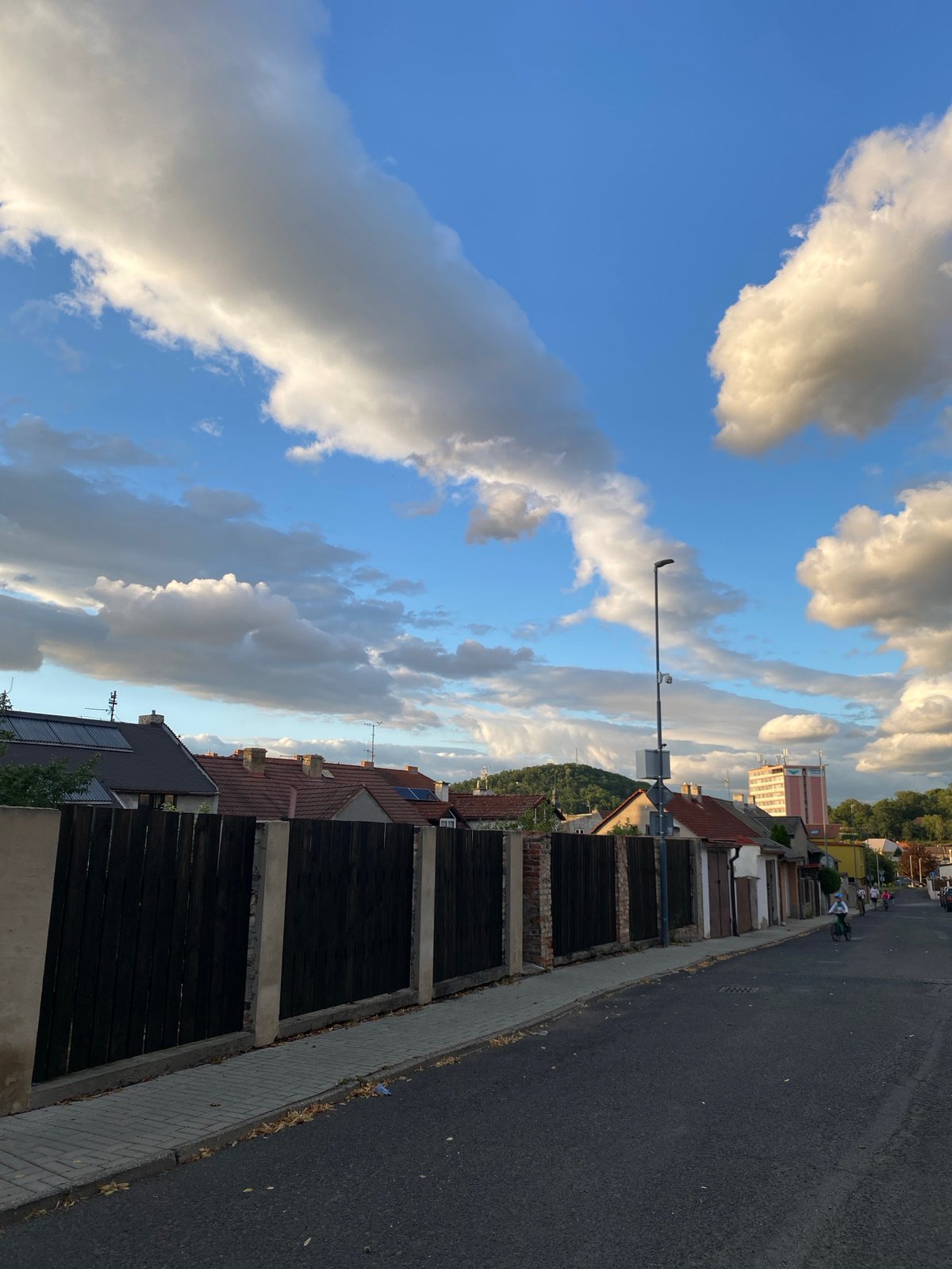 Evening stroll through Bílina streets at golden hour