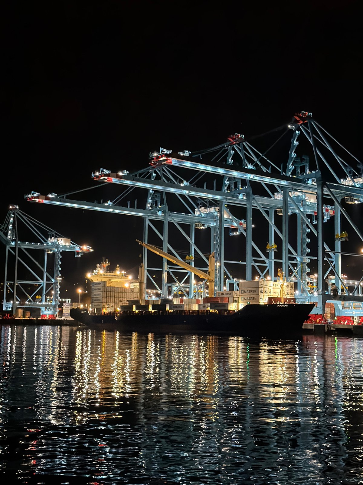 Illuminated cargo cranes observed at Rijeka port during nighttime