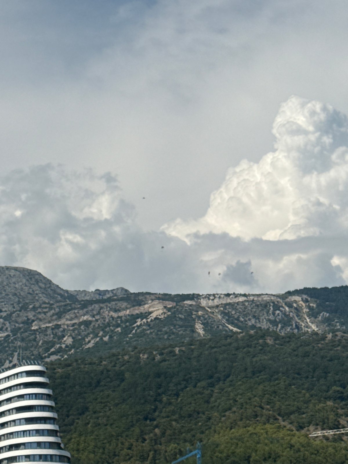 Paragliders and coastal scenery in Boreti, Montenegro