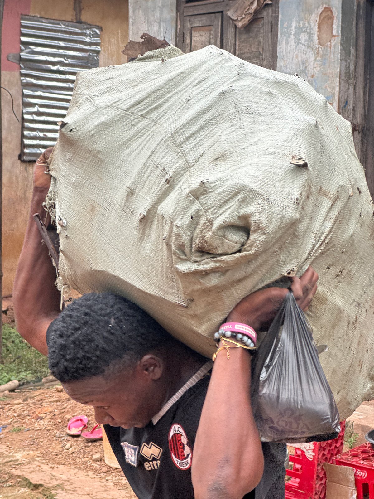 Street-level scenes from Enugu capture everyday and irregular activity