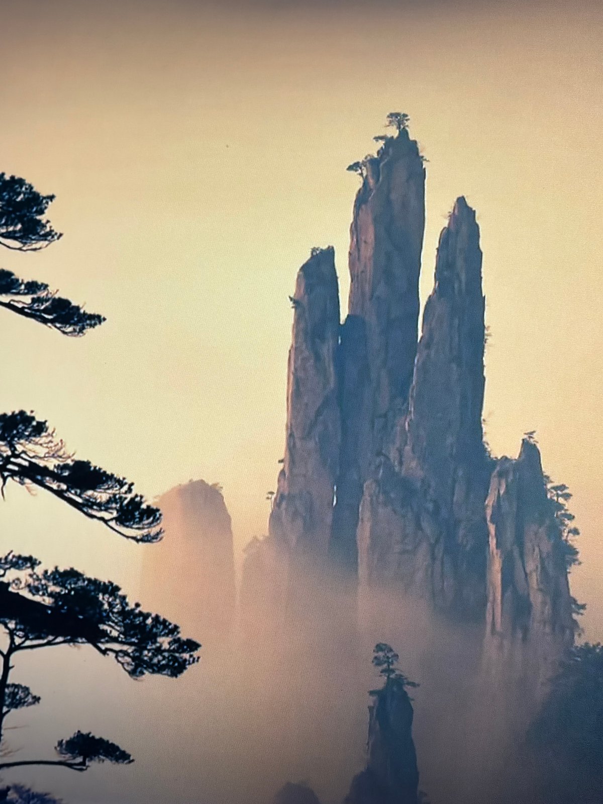Floating rock formations observed in hazy landscape