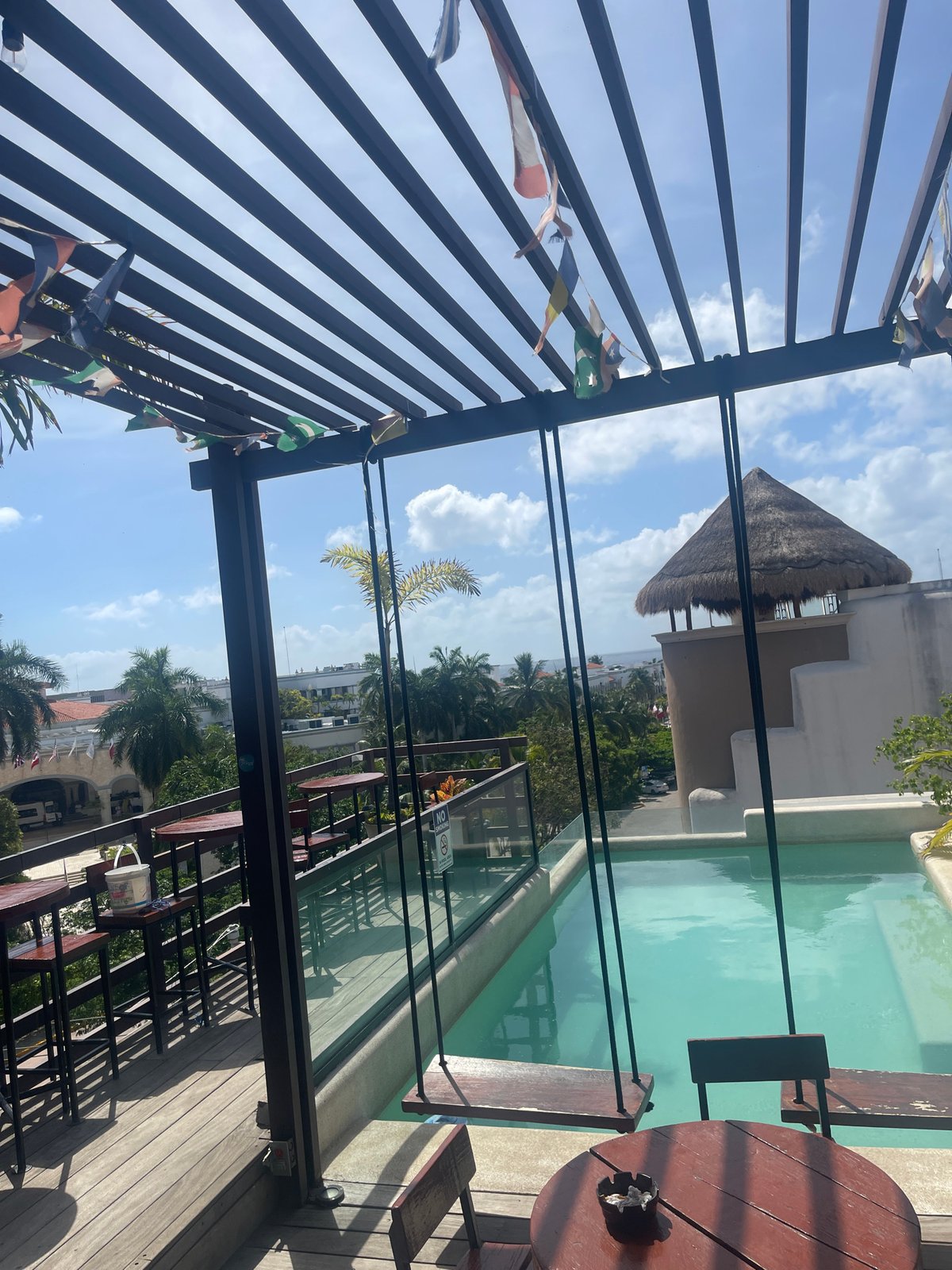 Rooftop pool area with pergola observed in Playa del Carmen