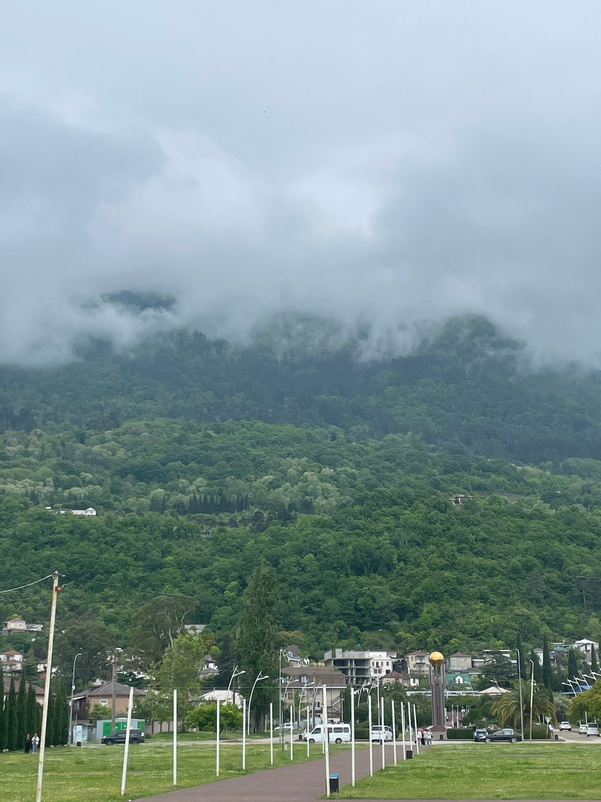 Tourist visits amusement park attractions in Gagra, Abkhazia