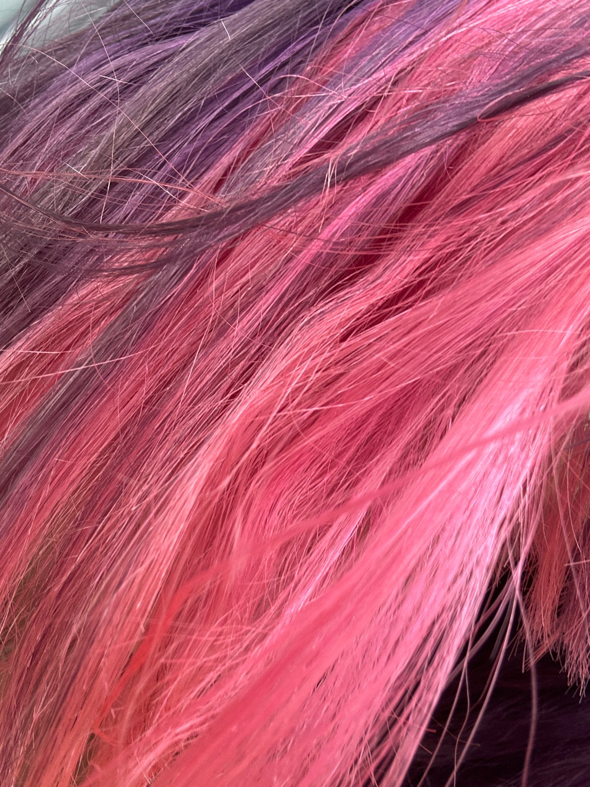 Bold dyed hair and dramatic eye makeup in Nha Trang