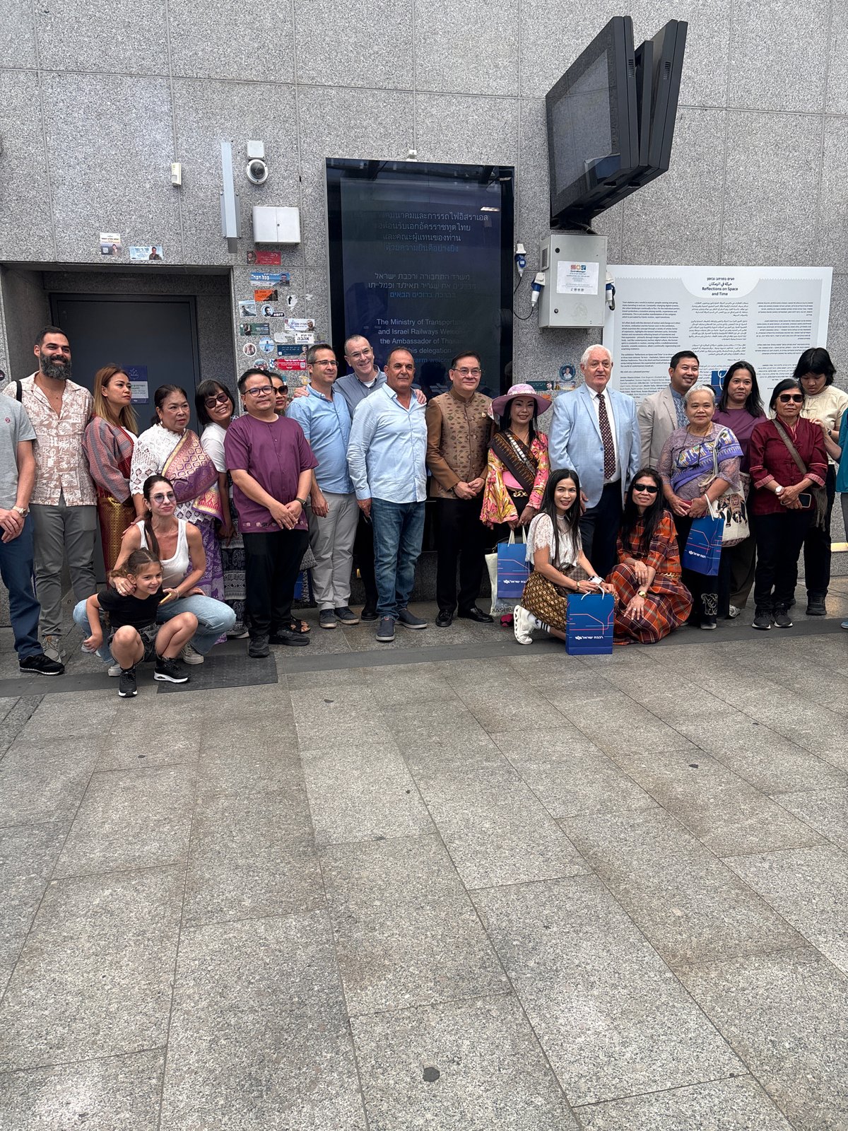 Group photo session captured in Tel Aviv public space