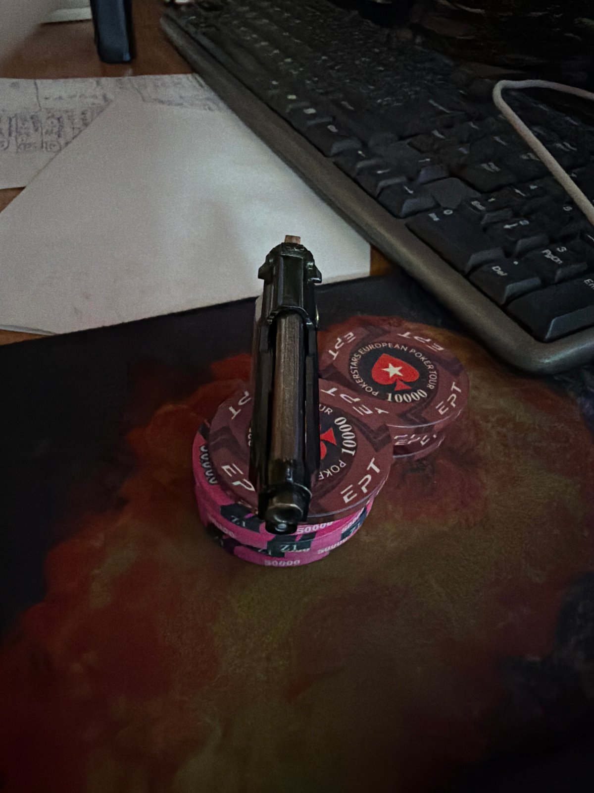 Poker chips and handgun photographed in Russian town