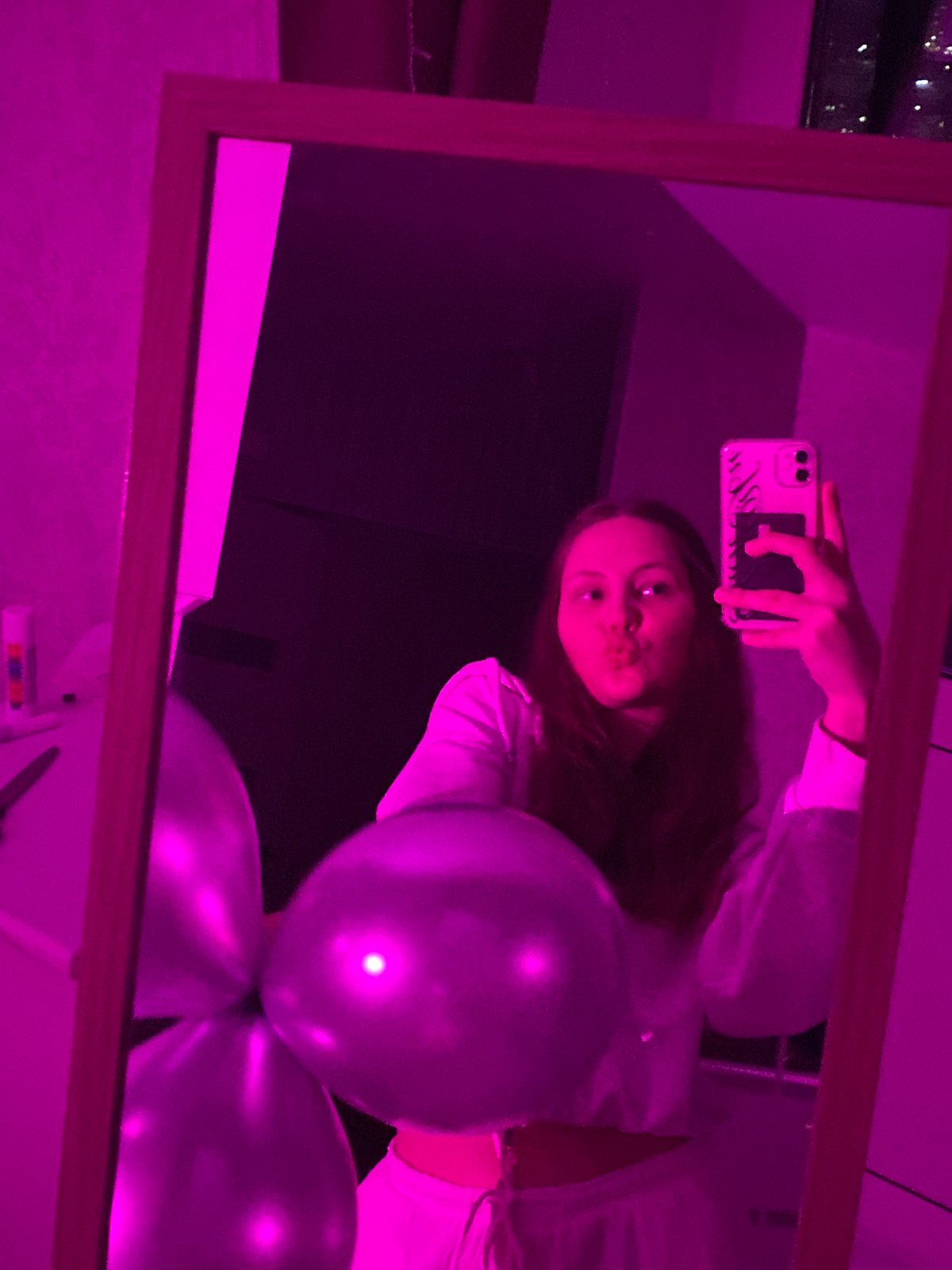 Woman takes colorful selfie session with balloons in Izhevsk
