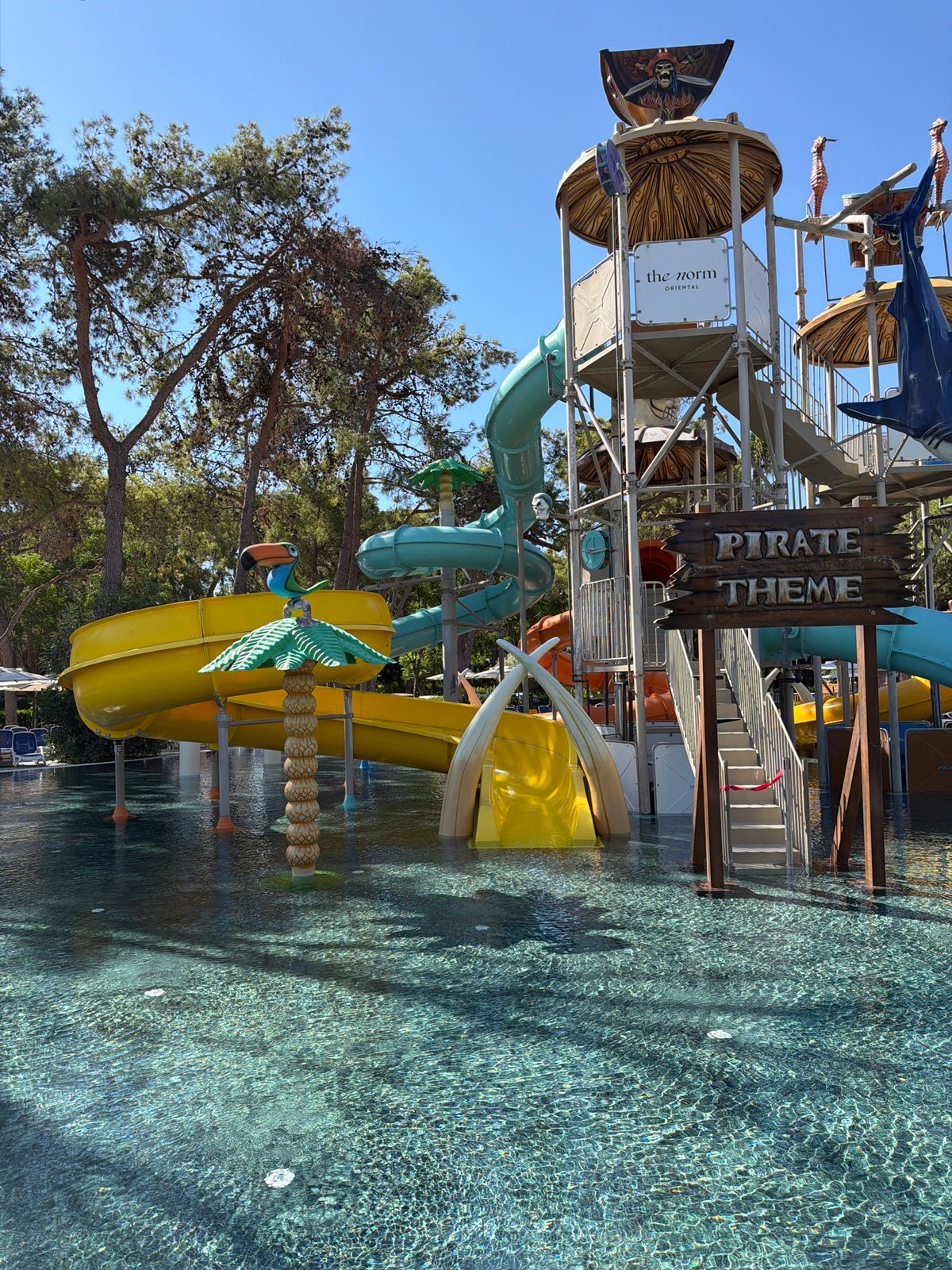 Summer morning in Kemer: water park, palm streets, and park life