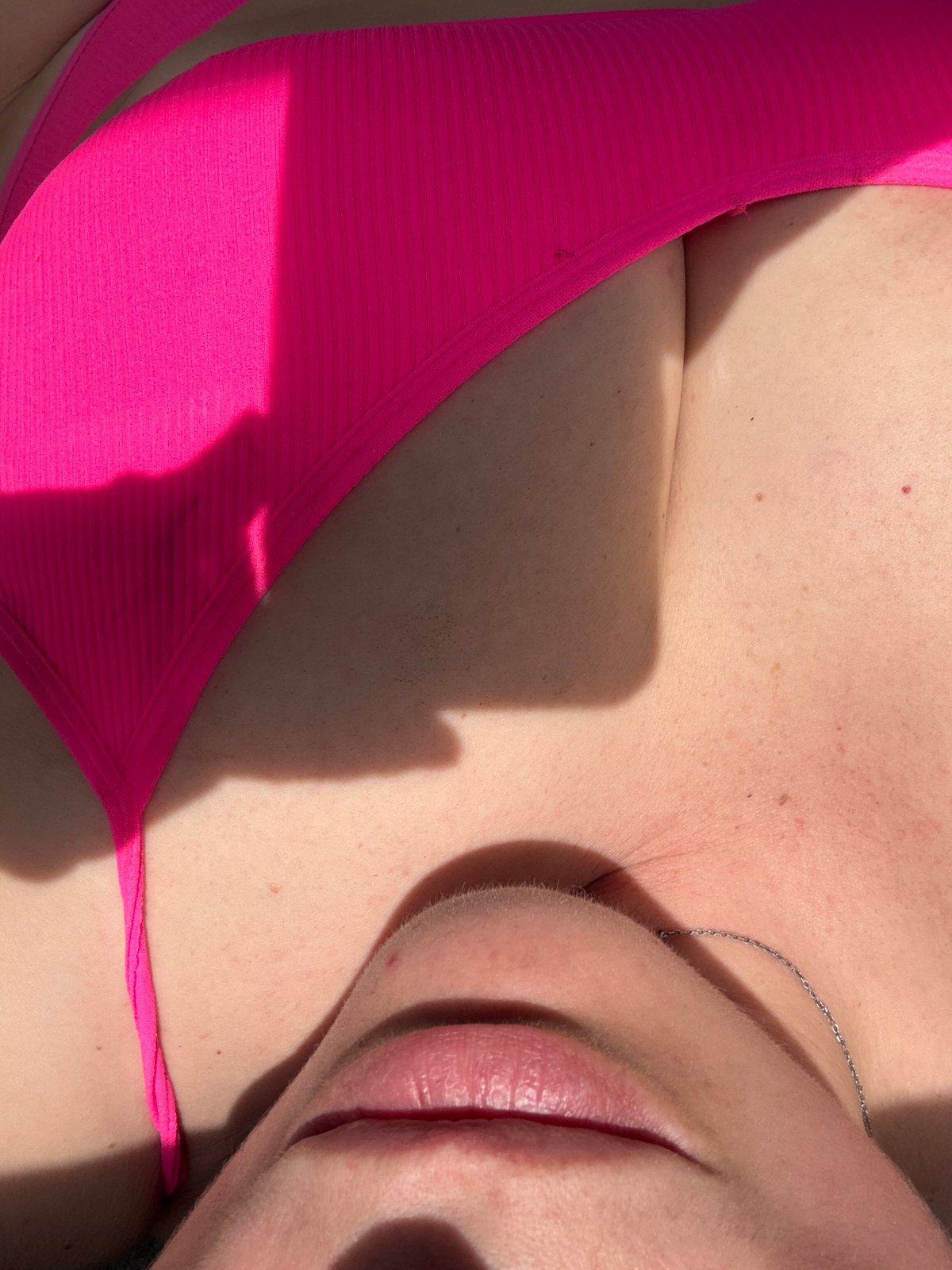 Woman in pink bikini photographed multiple times in Chaikovsky