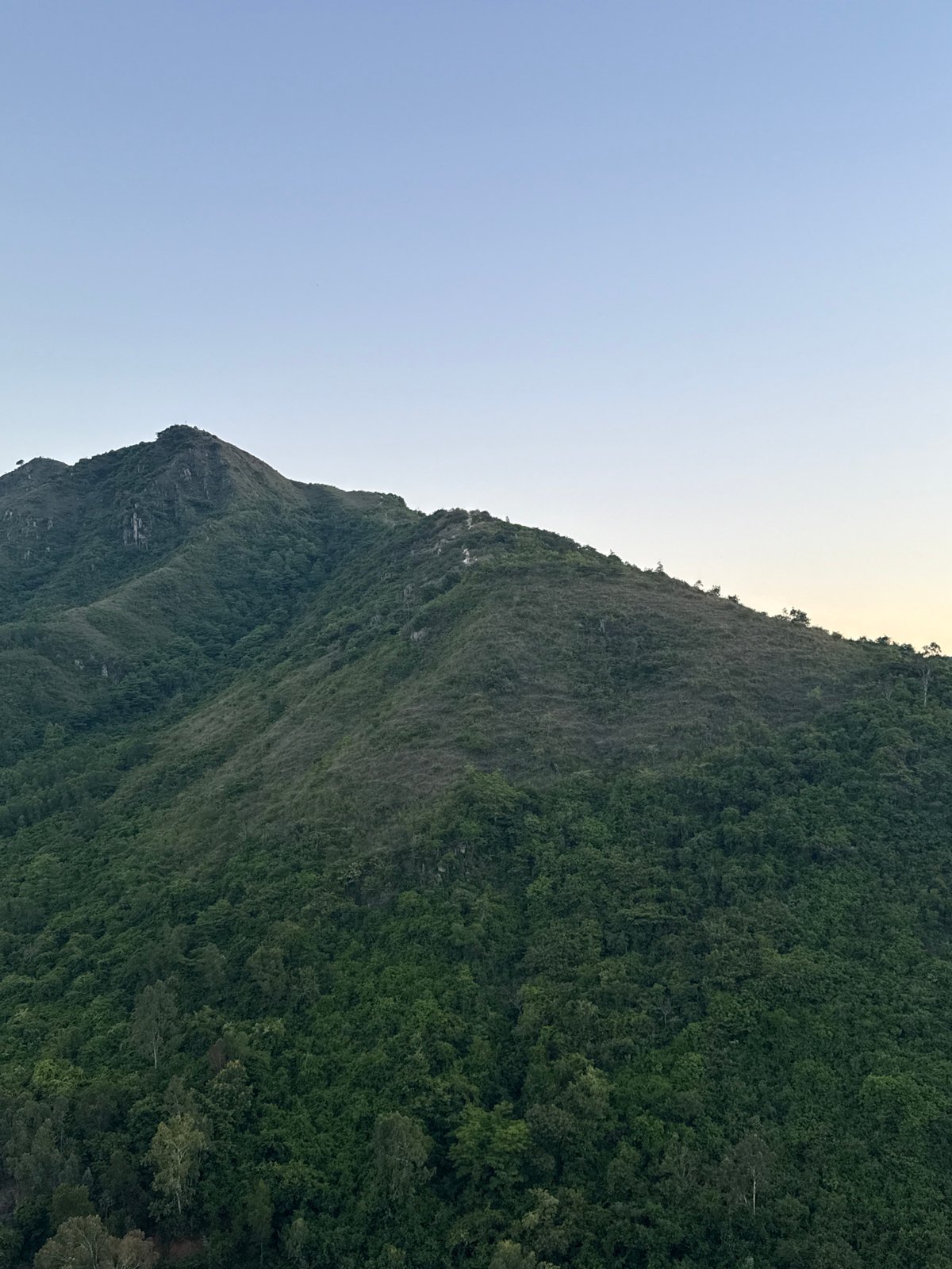 Nha Trang at twilight, city and mountains from above