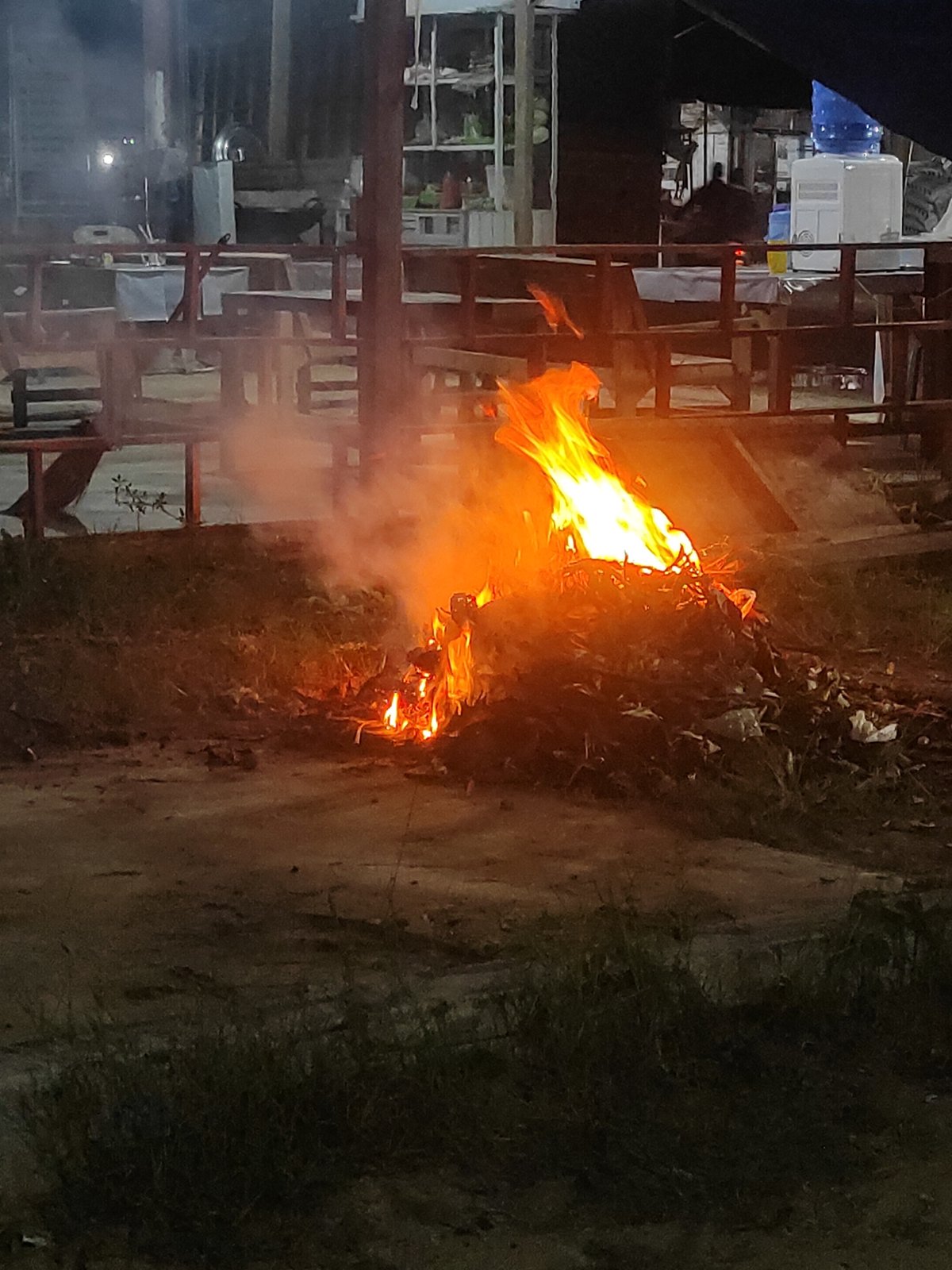 Trash and debris burning at night in Lhokseumawe