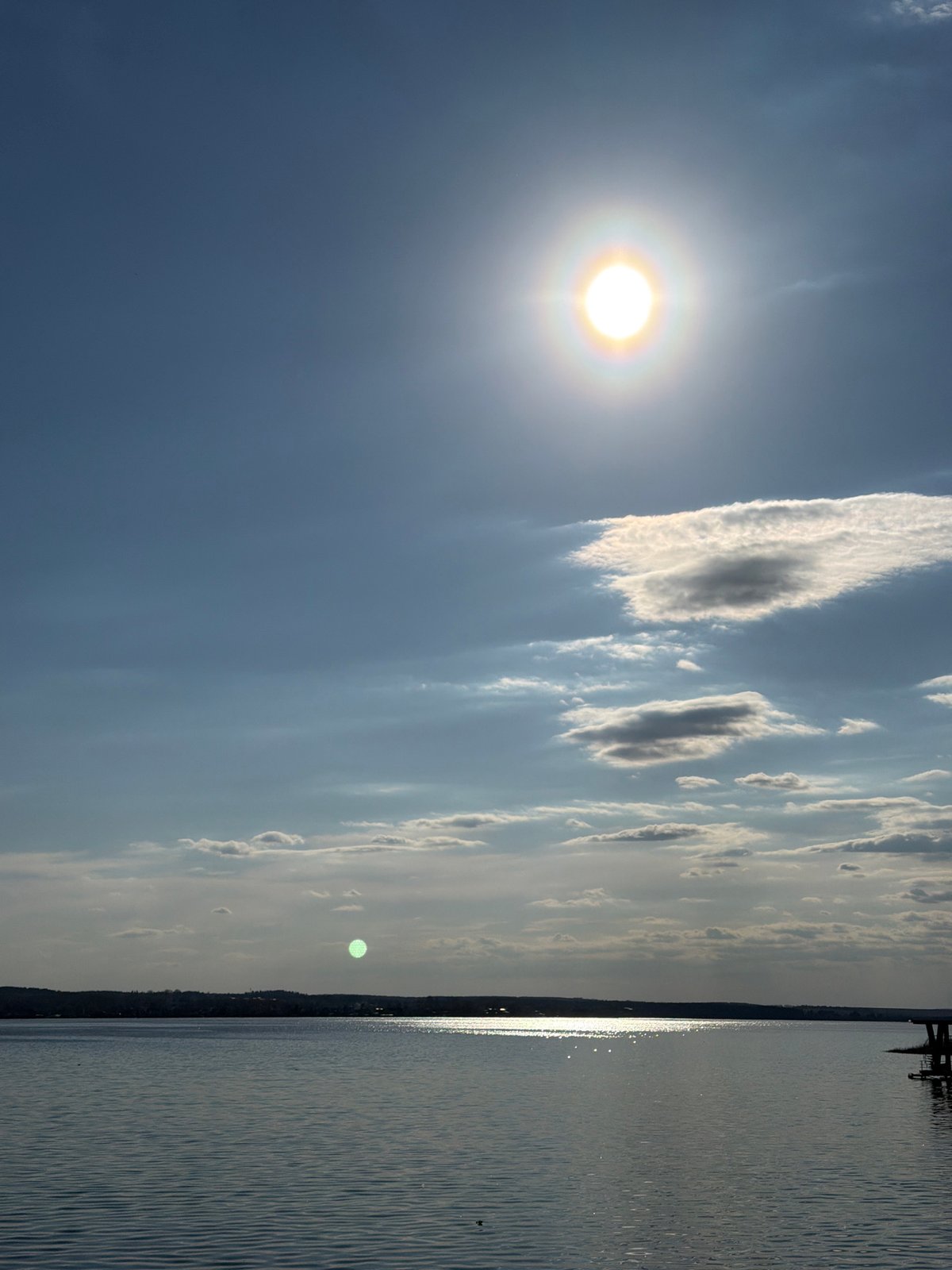 Mother and child enjoy sunny afternoon at Votkinsk waterfront