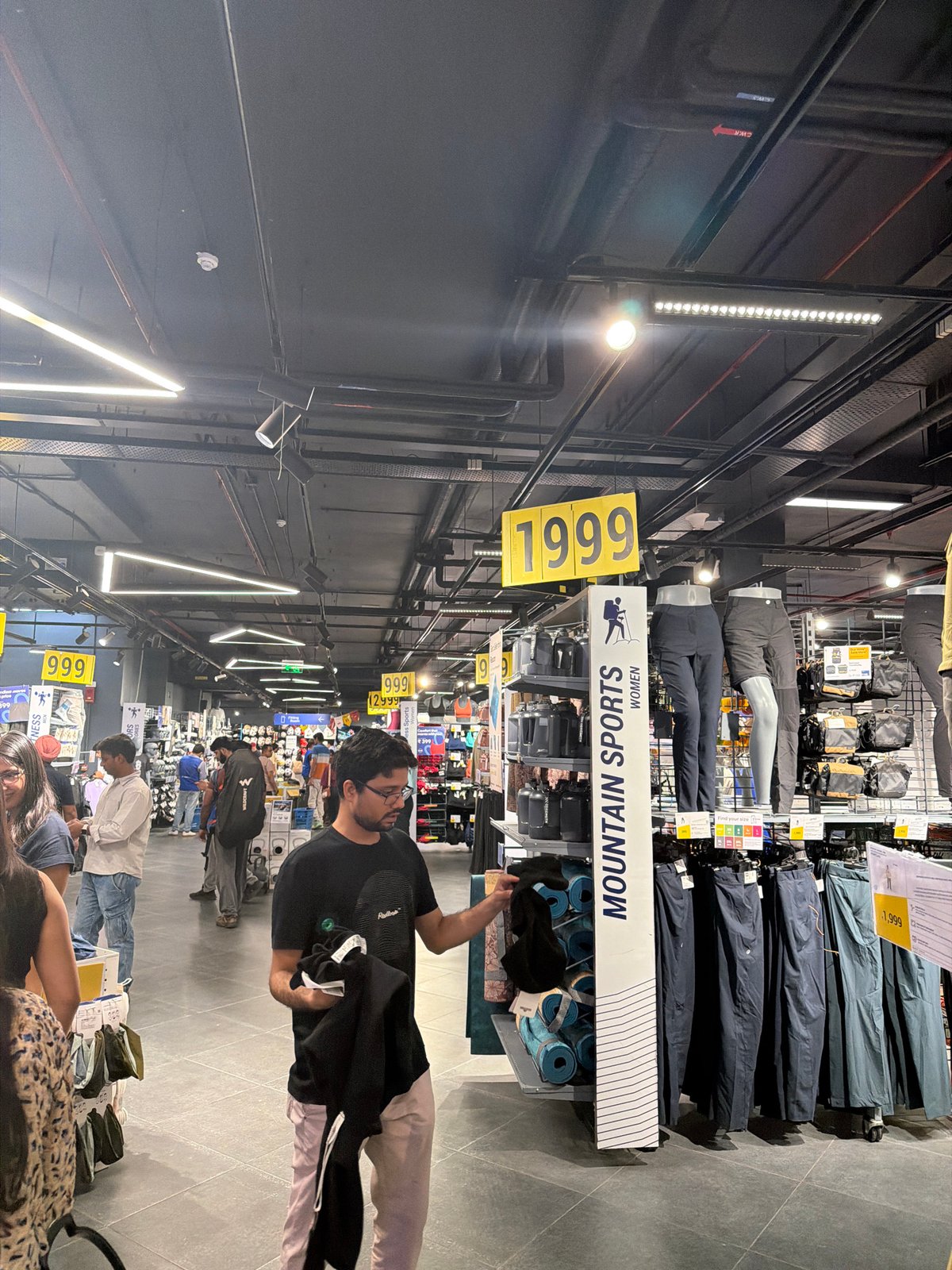 Routine shopping mall activity documented across Delhi retail centers