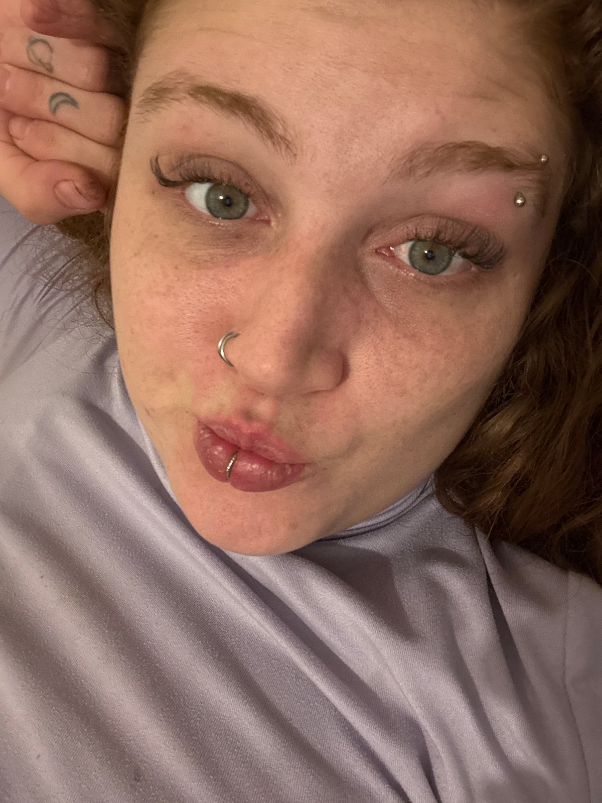 Portrait captured in Buenos Aires shows person with piercings