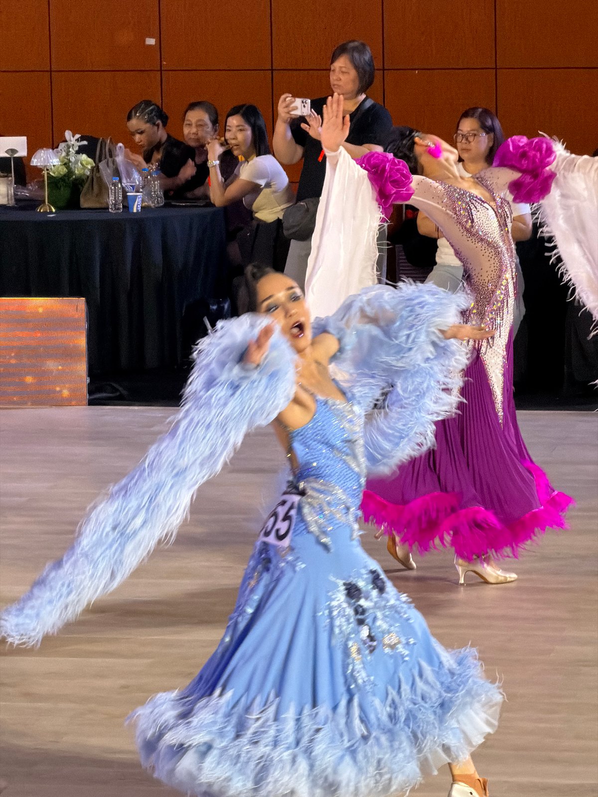 Ballroom dance competition held in Hanoi featuring costumed performers