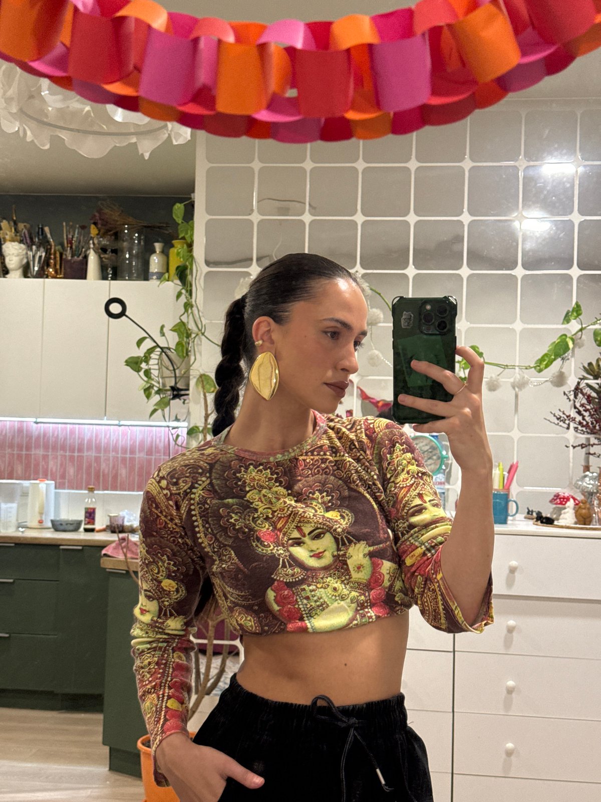 Woman takes selfies in decorated mirror in Krasnoyarsk