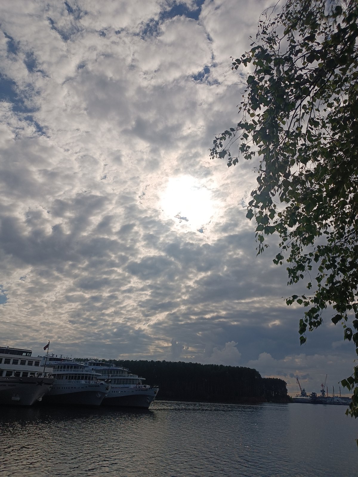 Tourist documents leisurely afternoon exploring Chaikovsky, Russia riverside and forests