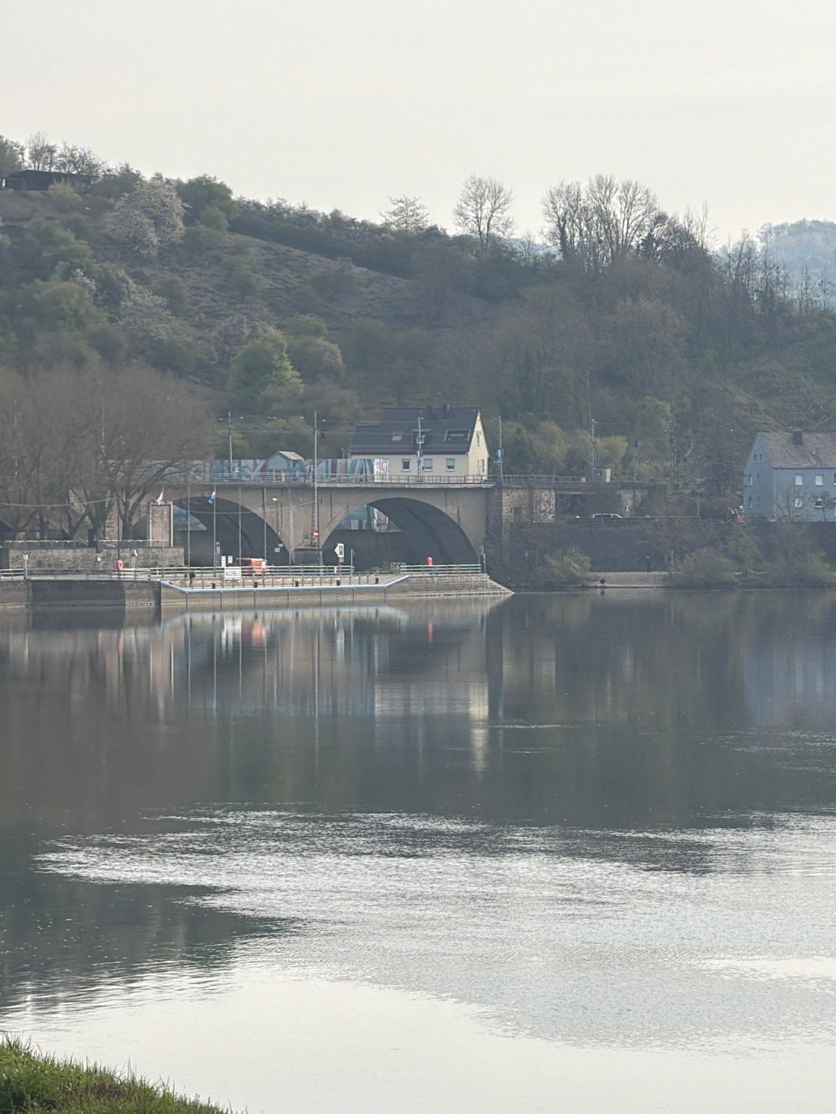 Morning light illuminates Moselle River bridges in Luxembourg