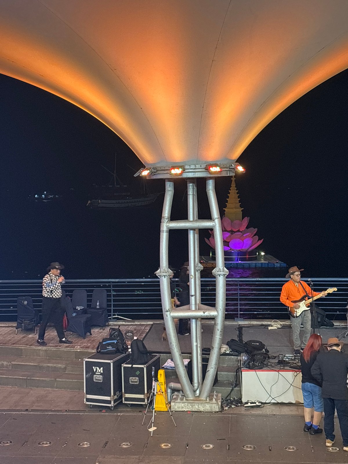 Country-themed live band plays waterfront stage at Ancol Baywalk