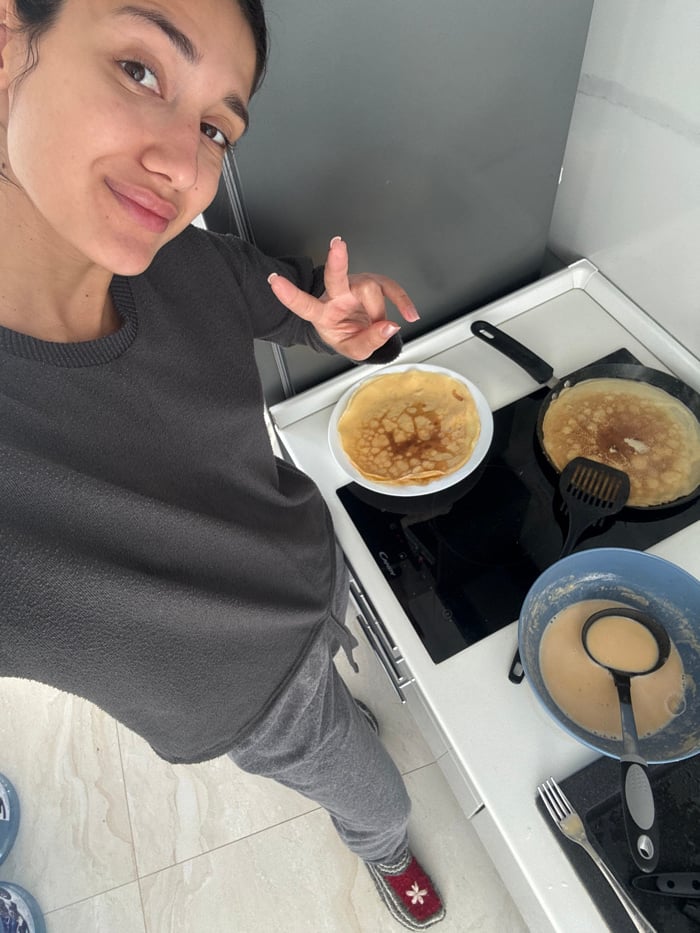 Woman films cooking content in Budva, Montenegro
