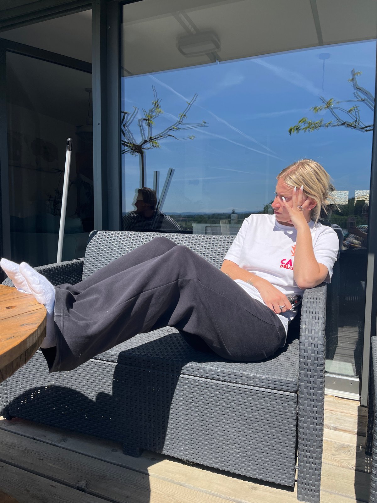 Young person enjoys sunny afternoon outdoors in Chambœuf