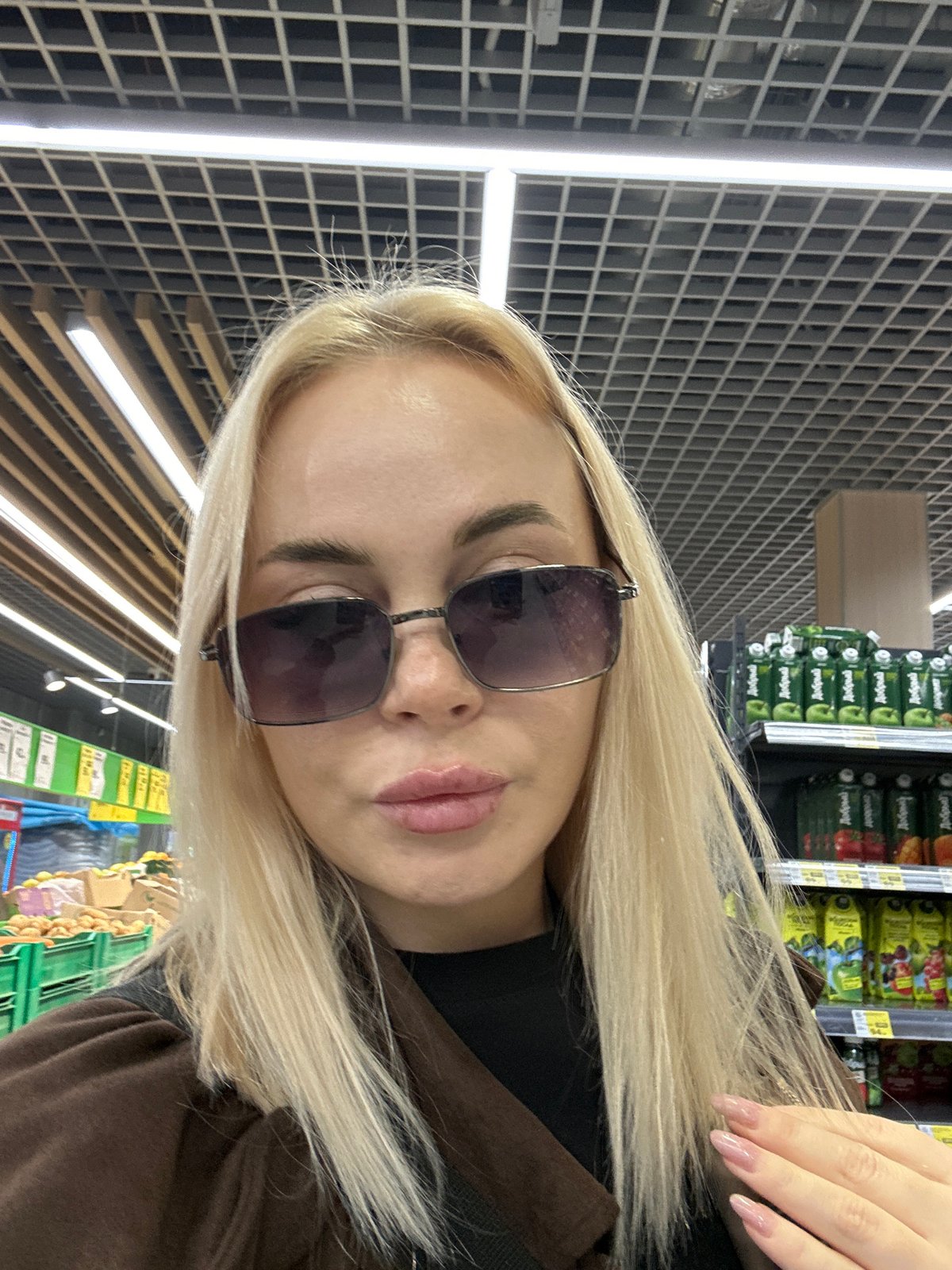 Woman shops at retail store in Megion, Russia