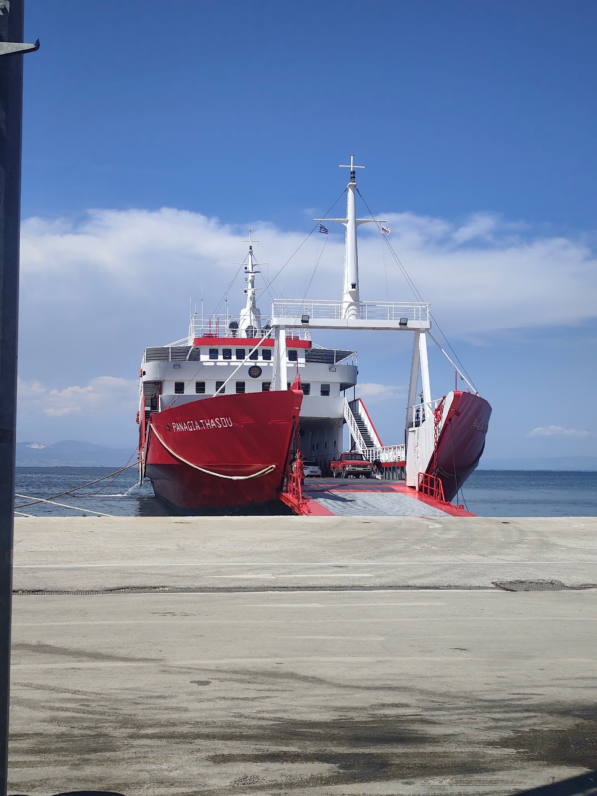 Ferry operations documented at Mediterranean port during midday hours