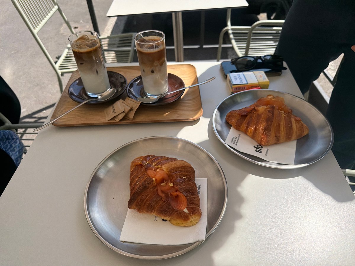 Morning coffee break at Milan cafe captures casual dining moment
