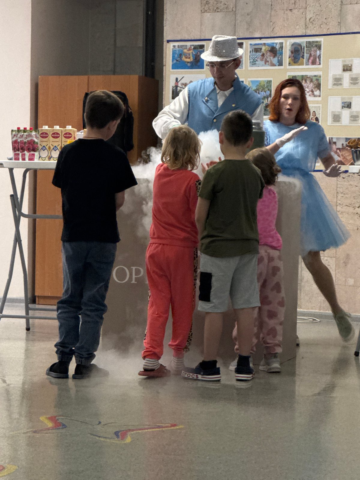 Magician entertains children at indoor event in Yevpatoriya