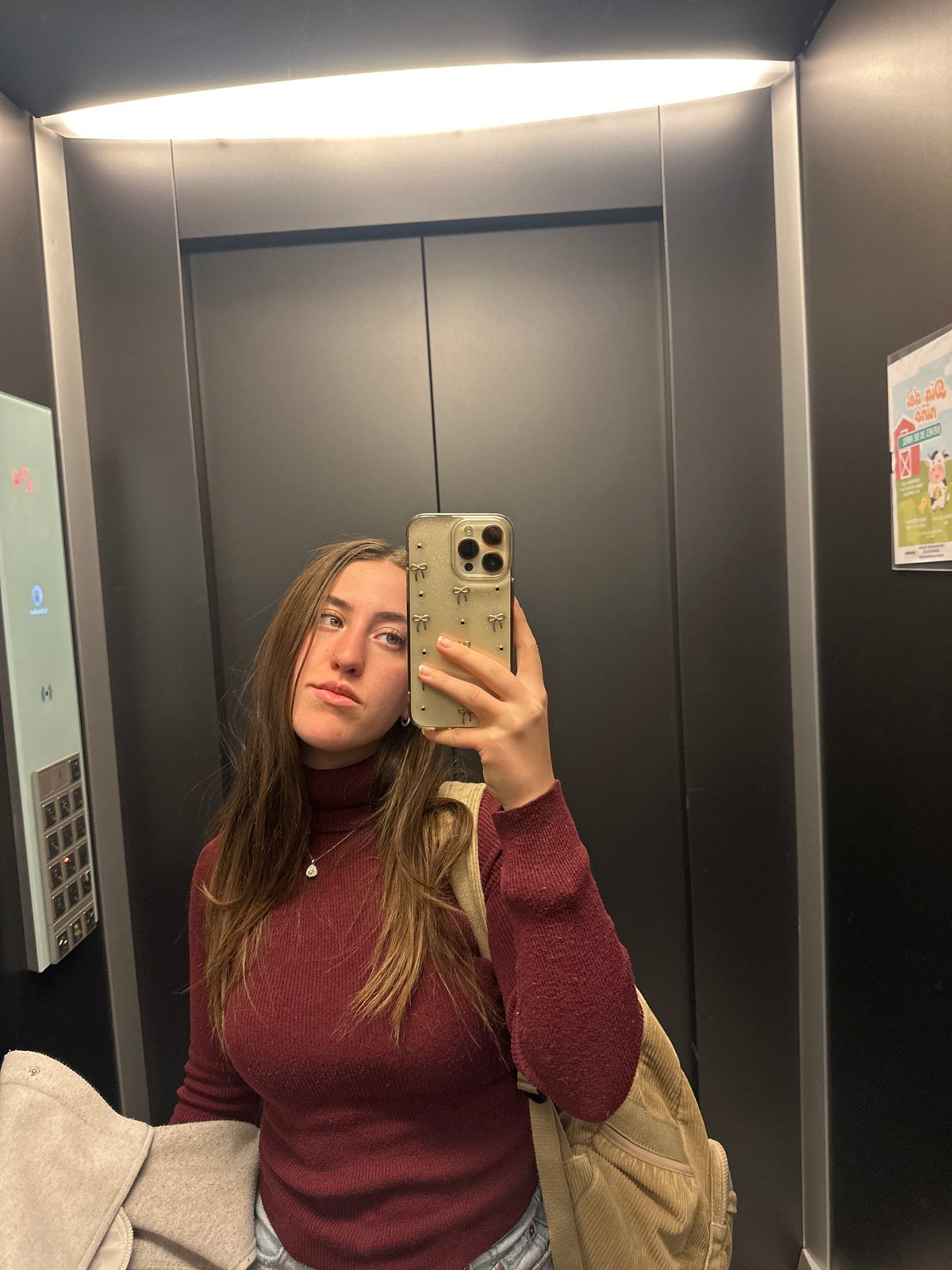 Woman takes selfie in elevator in Huixquilucan, Mexico