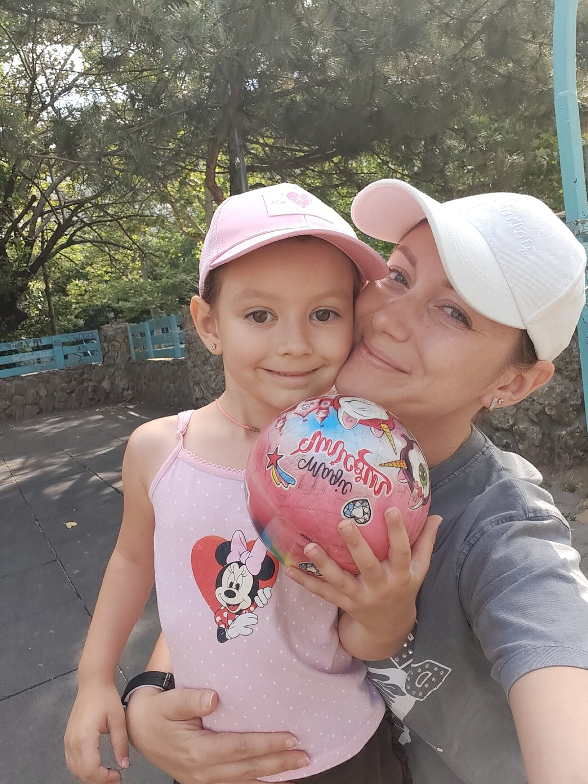 Playground afternoon in Chornomorsk with a dog and pink everything
