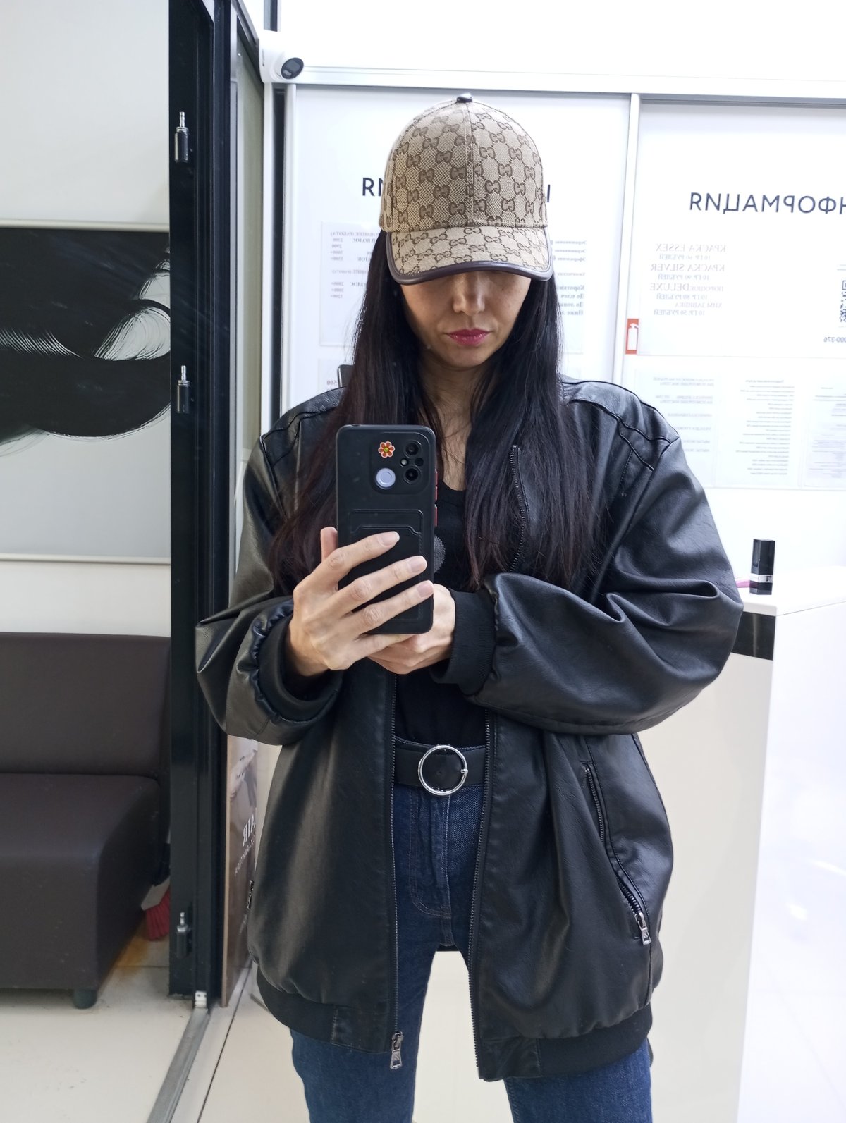 Women photographed taking selfies across Izhevsk, Russia locations