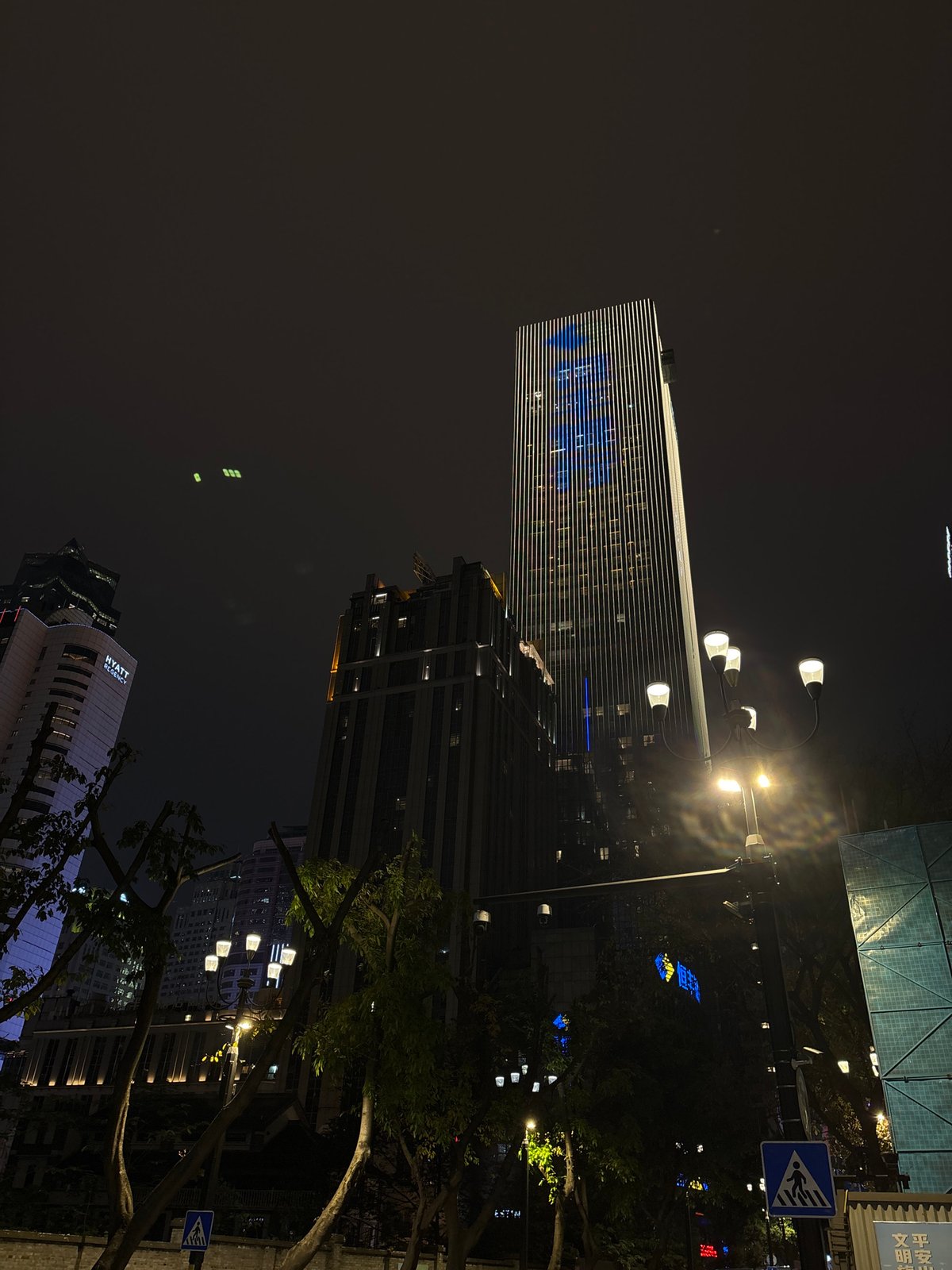 Nighttime urban architecture photographed in Yuzhong District, China