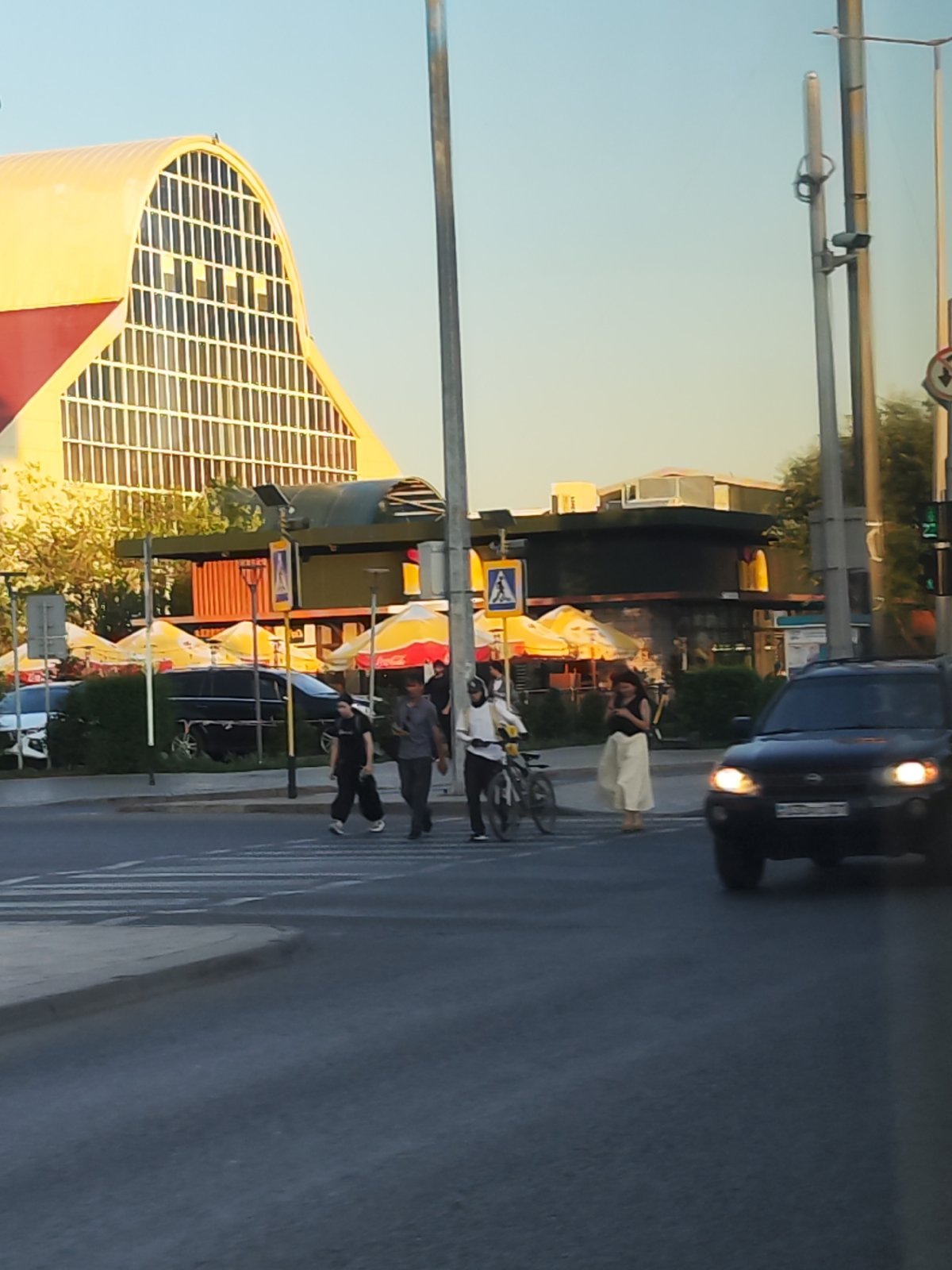 Street-level look at a mixed-use neighborhood in central Astana