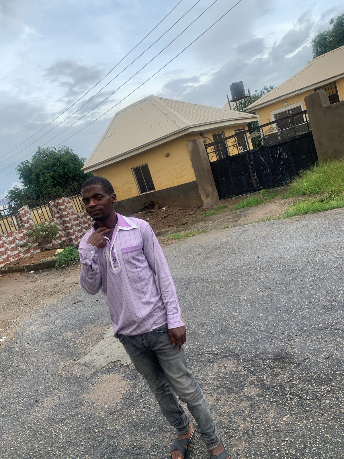 Casual street portraits along a residential block in Abuja