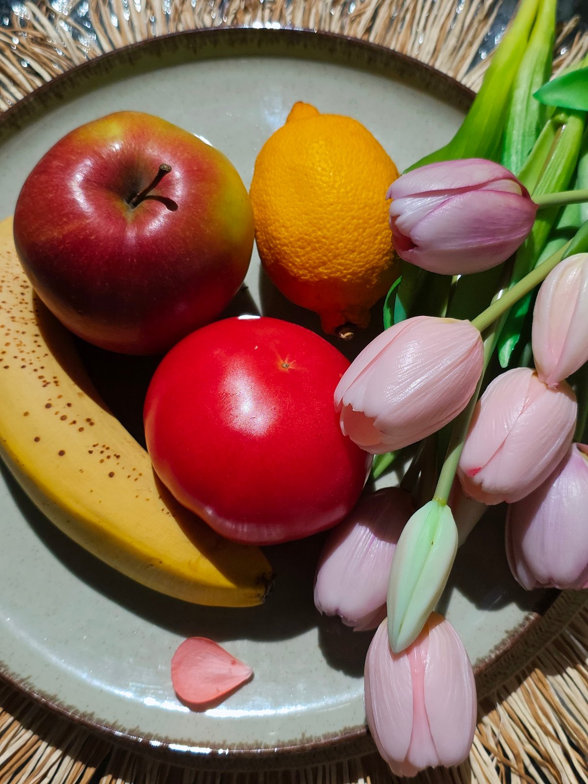 Still-life photography session captures fruit arrangements and garden scenes