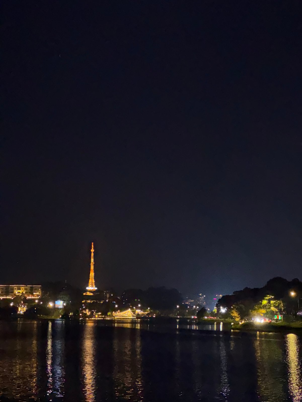 Nighttime water reflections captured in Da Lat, Vietnam