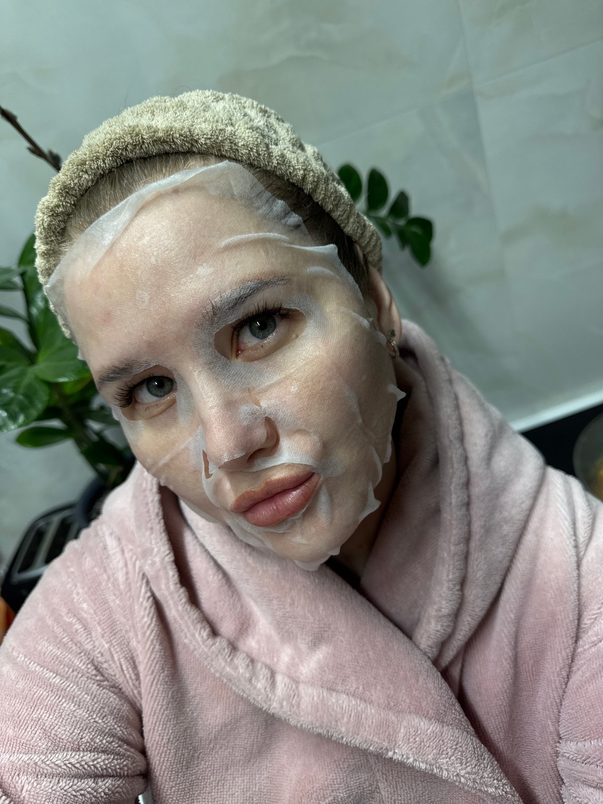Late-night skincare routine with pet cat in rural Russia
