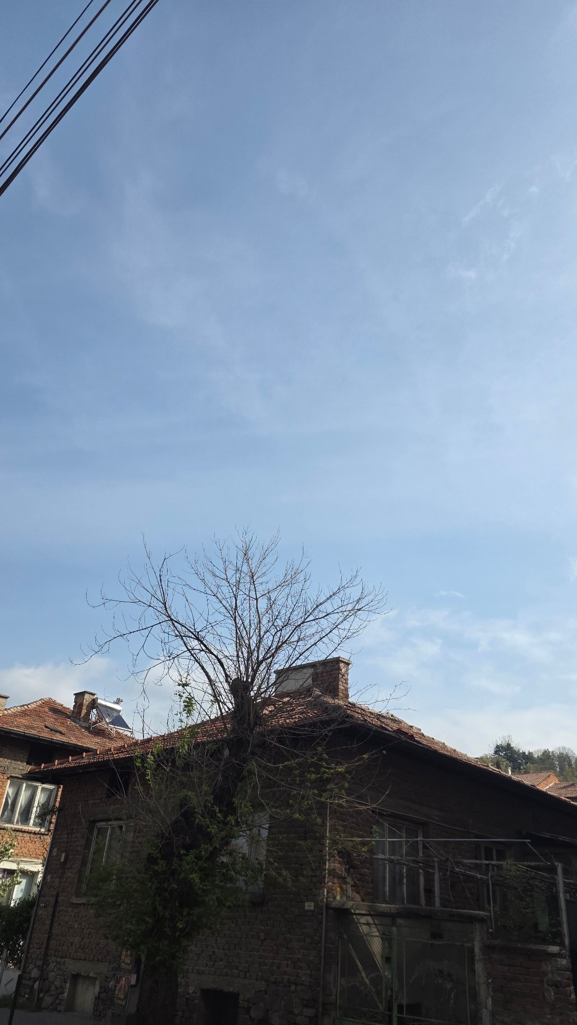 Morning street photography captures upward views in Blagoevgrad, Bulgaria