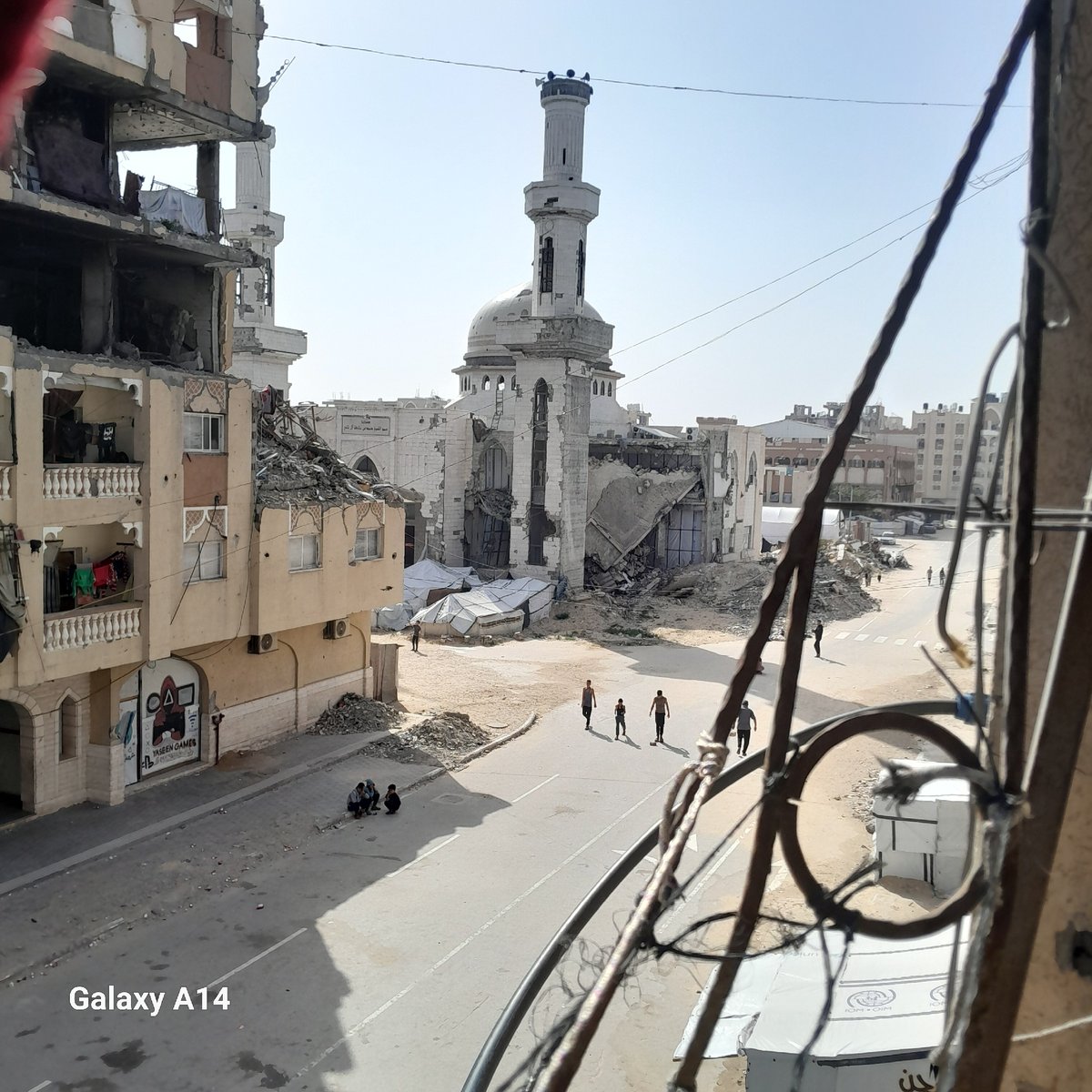 Urban destruction documented across unidentified city, casualties reported