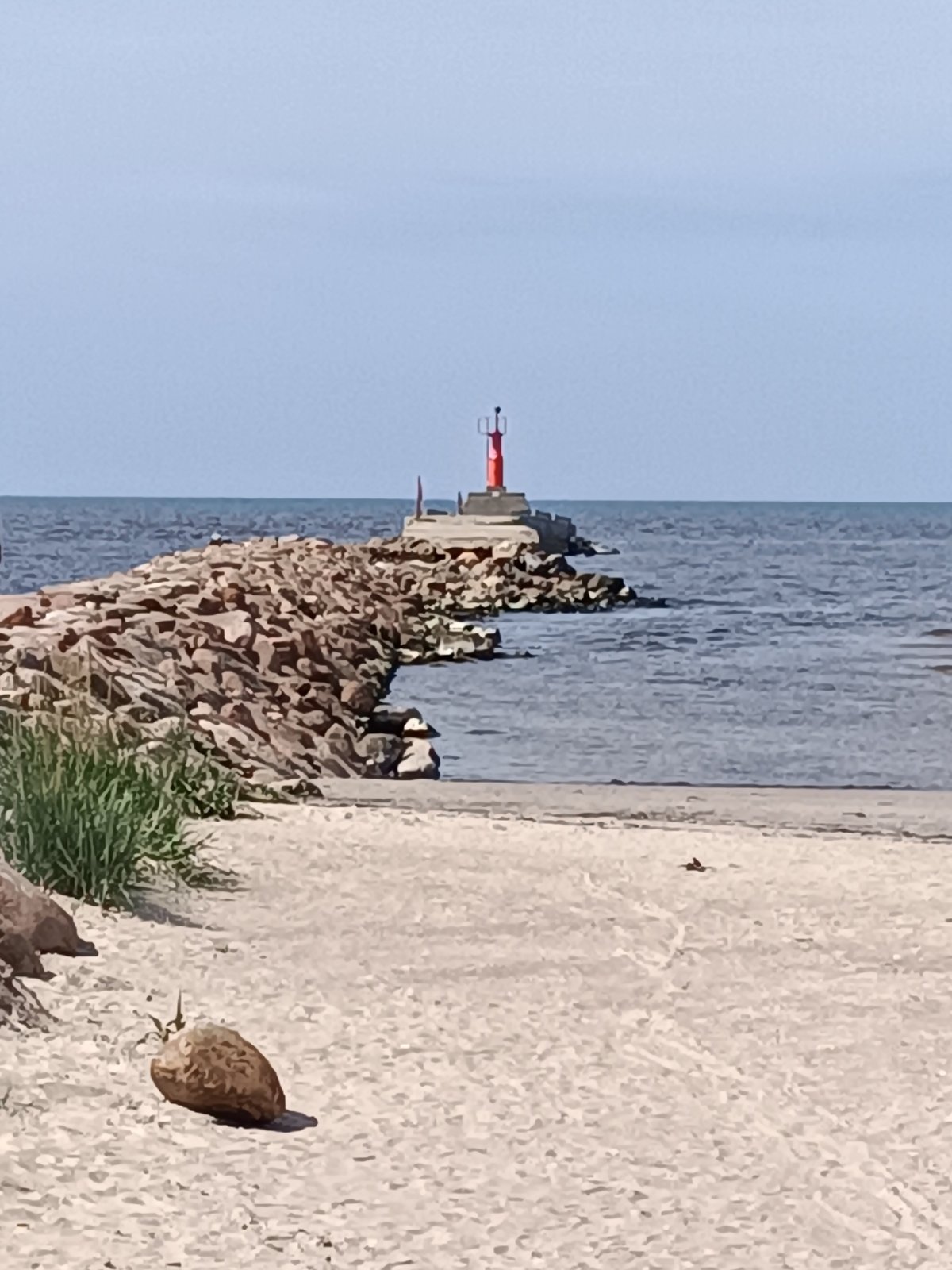 Pāvilosta harbor and coastline on a Baltic summer afternoon