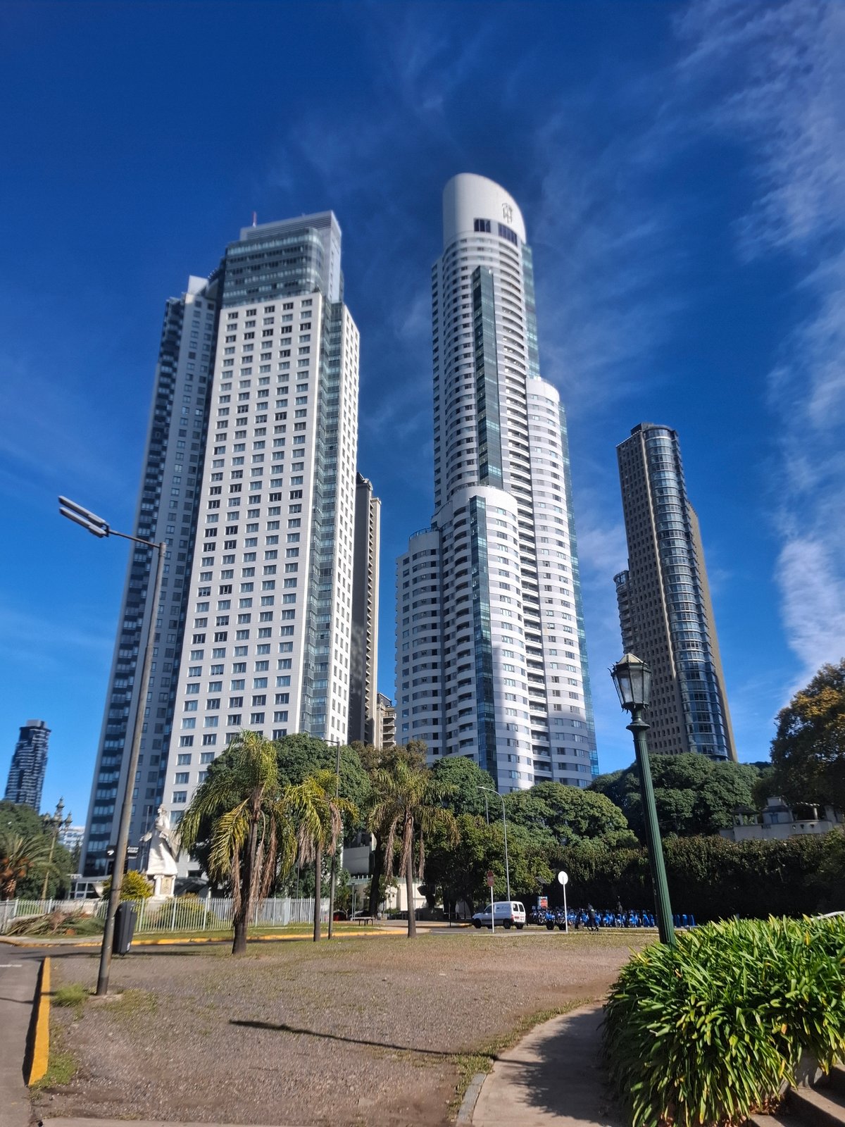 Family afternoon in Buenos Aires park near Puerto Madero towers