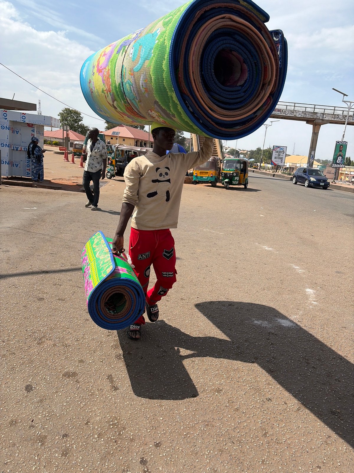 Daily life unfolds in Jos Nigeria streets and markets