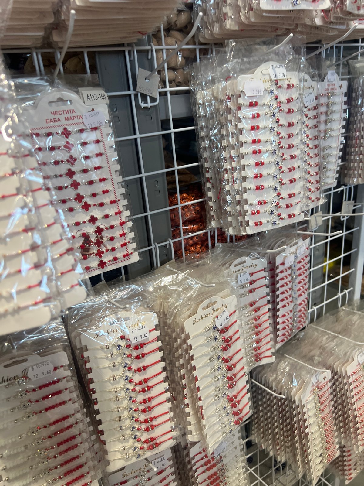 Craft store displays traditional Bulgarian Martenița bracelets in Burgas